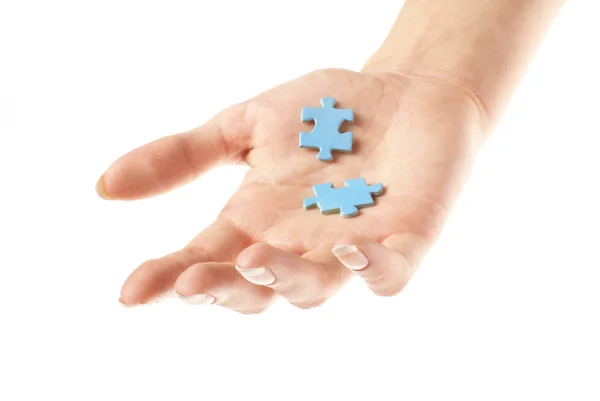 Hand with puzzle — Stock Photo, Image