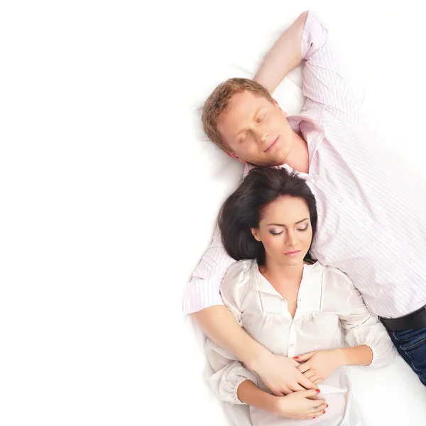 Young happy couple over white background — Stock Photo, Image