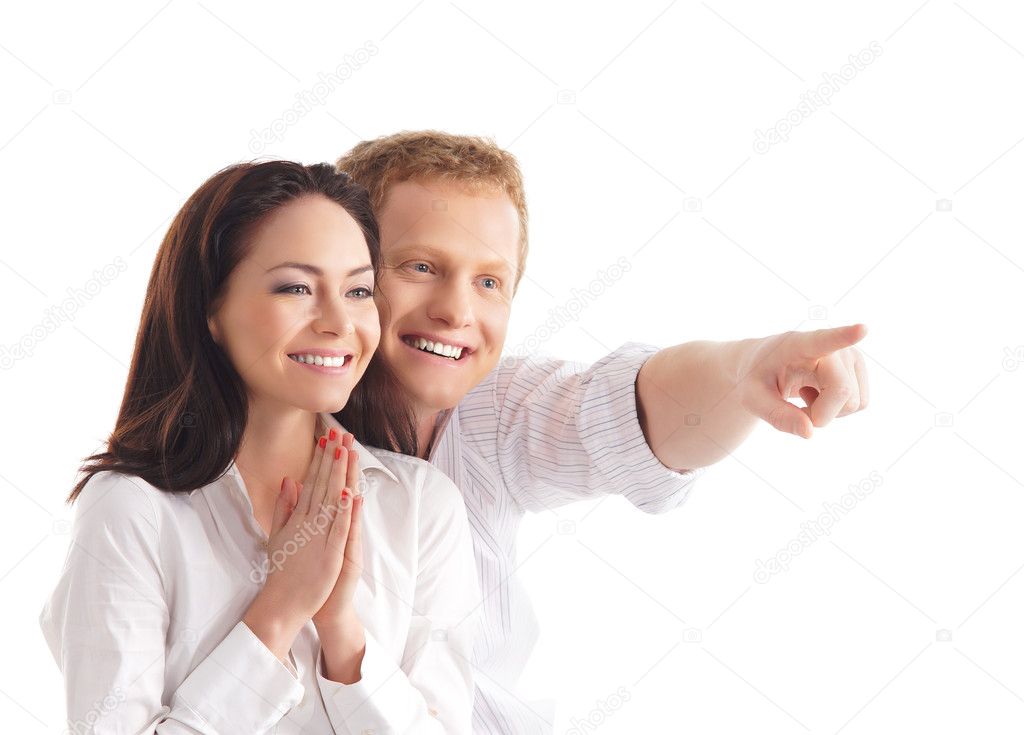 Young happy couple over white background