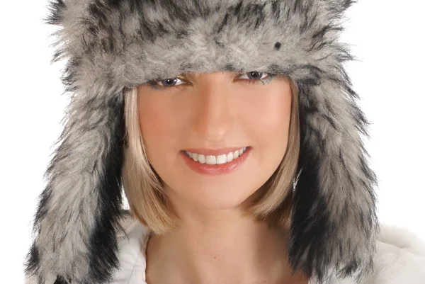 Atraktivní mladá dívka, která nosí kožešinové čepici Stock Snímky