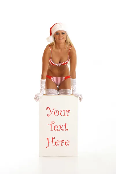 Jonge sexy santa krijgt uit een doos — Stockfoto