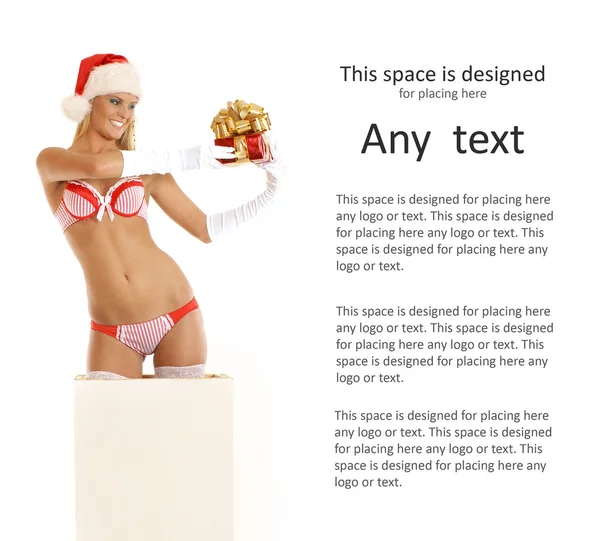 Jonge sexy santa krijgt uit een doos — Stockfoto