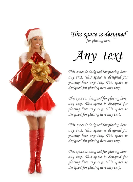 Giovane Babbo Natale sexy con un grande regalo — Foto Stock