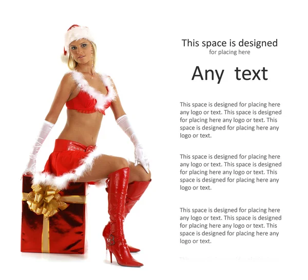 Молодой сексуальный Санта с рождественским подарком — стоковое фото