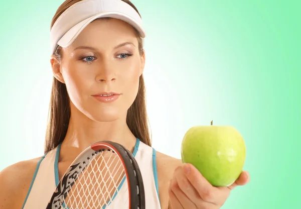 Junge fitte Tennisspielerin — Stockfoto