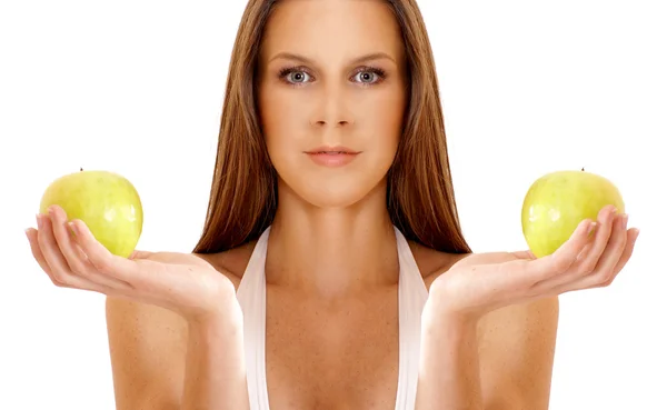 Young attractive brunette with apple — Stock Photo, Image