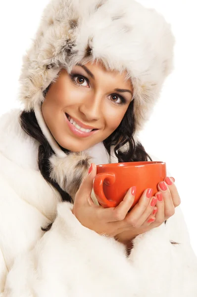 Young and beautiful woman with a red cup isolated on white — Stock Photo, Image