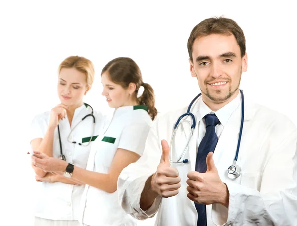 Squadra di giovani e intelligenti operatori medici isolati su bianco — Foto Stock