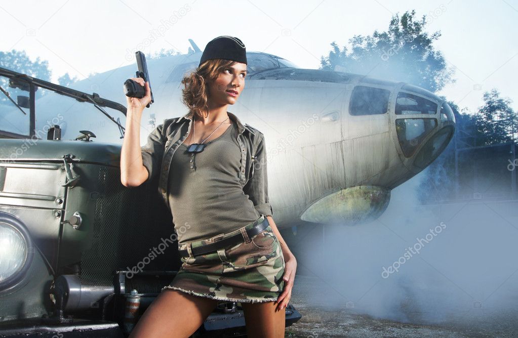 Young and sexy female soldier