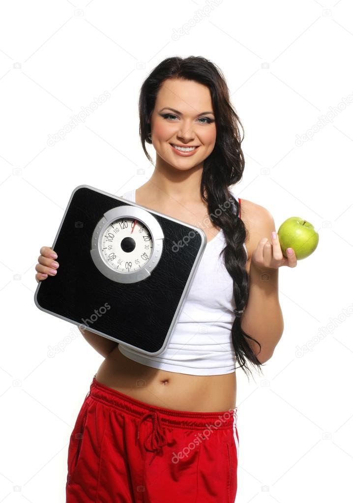 Portrait of young and healthy woman as dieting concept