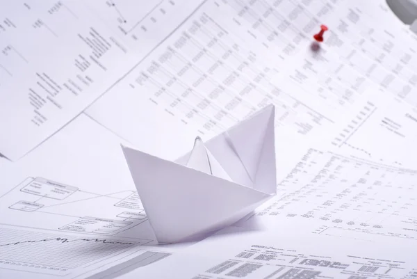 Business concept of paper boat and documents — Stock Photo, Image