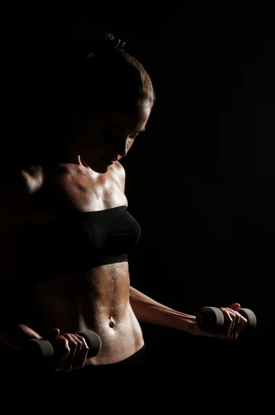 Sportig magen över mörk bakgrund — Stockfoto