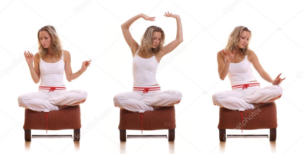 Young beautiful fit lady meditating