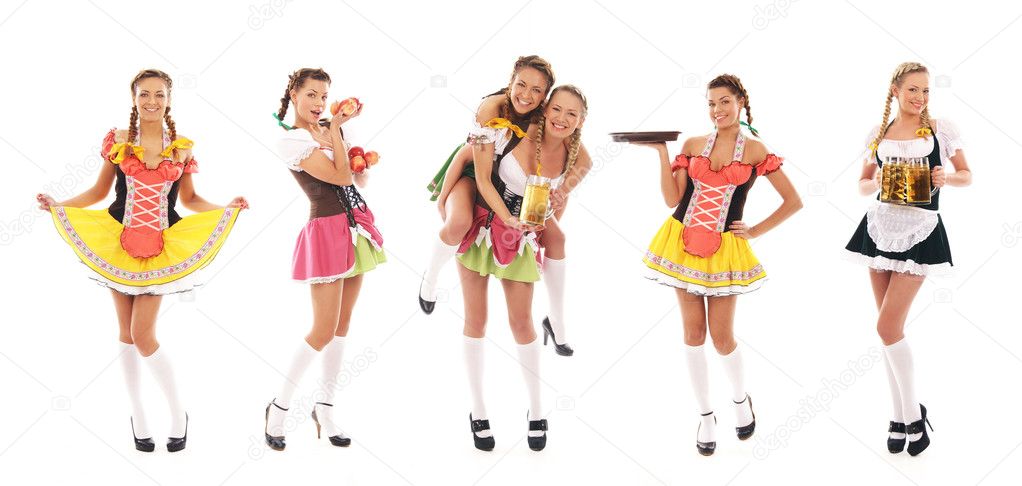 Young and beautiful bavarian girls isolated over white backgroun