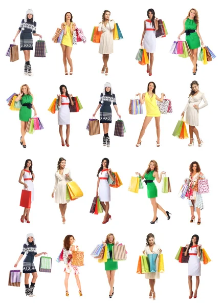 Mujeres hermosas jóvenes con algunas bolsas de compras aisladas en blanco —  Fotos de Stock