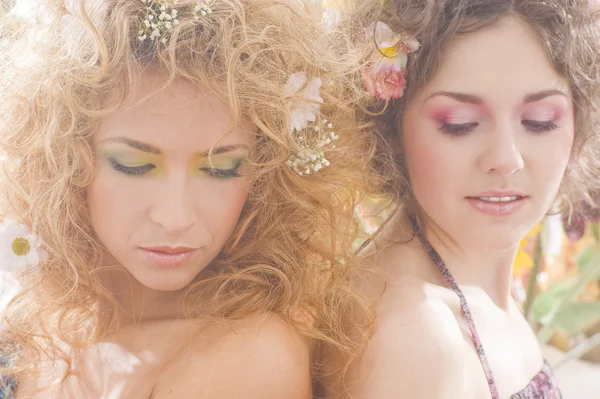 Fashion shoot of young beautiful nymphs in the spring forest — Stock Photo, Image
