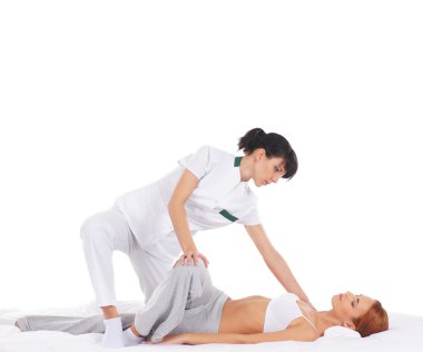 Küçük kızıl saçlı kadın Tay masajı yordam