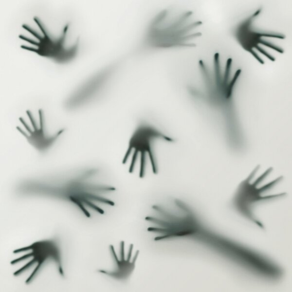 Frightening silhouette of many different hands