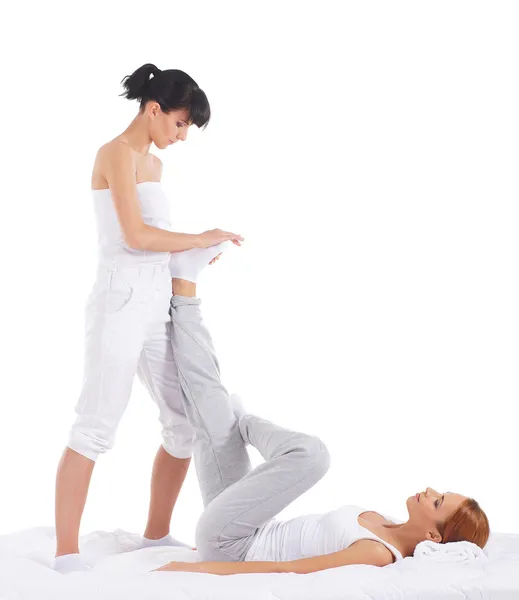 A young redhead woman on a Thai massage procedure — Stock Photo, Image