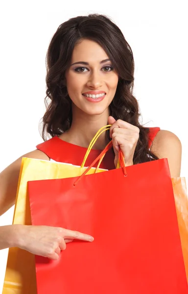 Mooie vrouw met sommige shopping tassen — Stockfoto