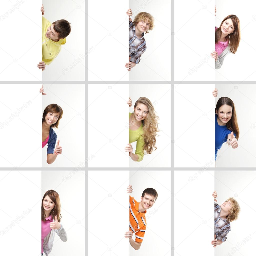 Set of teenagers with a giant, blank, white billboard