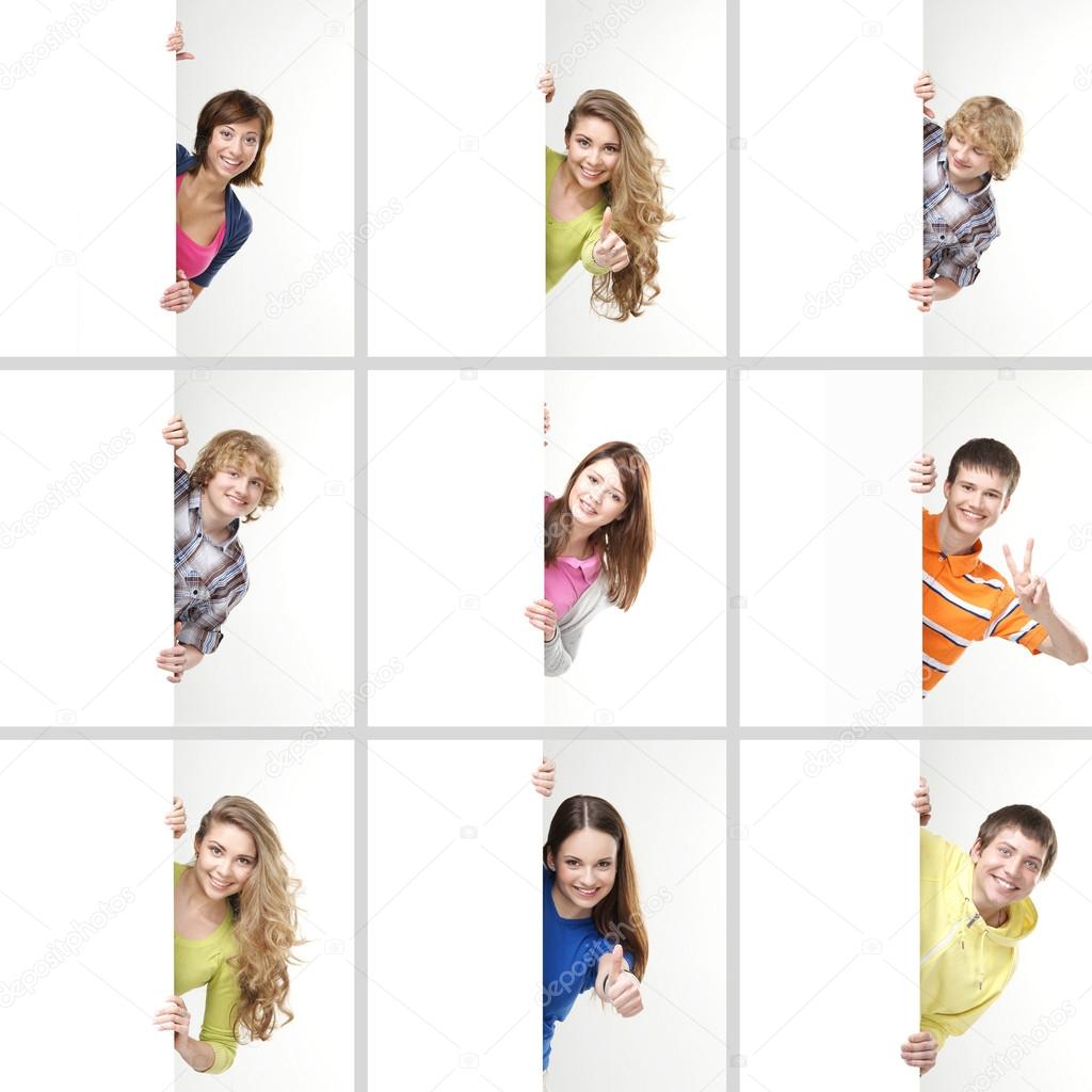 Set of teenagers with a giant, blank, white billboard