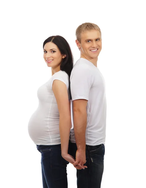若い魅力的なカップル:妊娠中の母親と幸せな父親 — ストック写真