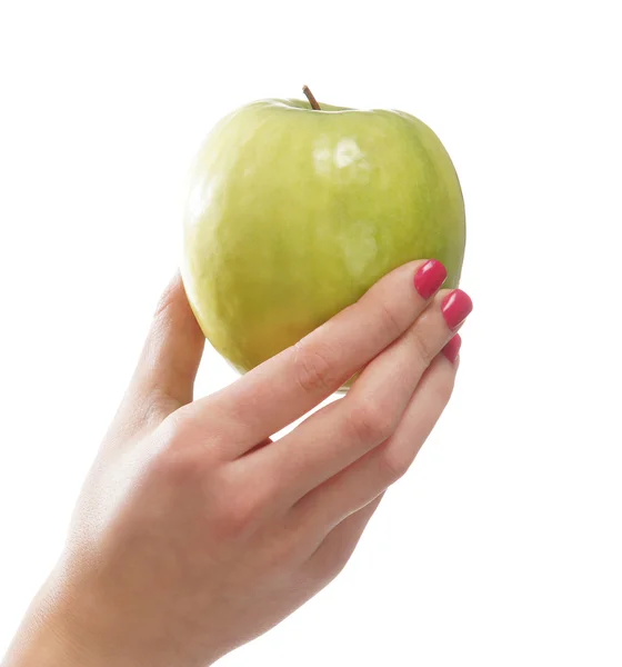 Bella mano femminile con la mela isolata su bianco — Foto Stock