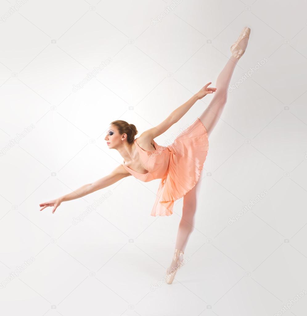 Young and beautiful ballerina dancing