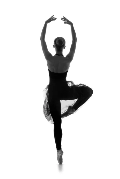 Una joven bailarina de ballet con un vestido sobre un fondo blanco —  Fotos de Stock