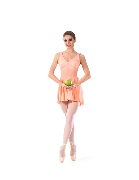 A young ballet dancer in a light dress on a white background — Stock Photo, Image