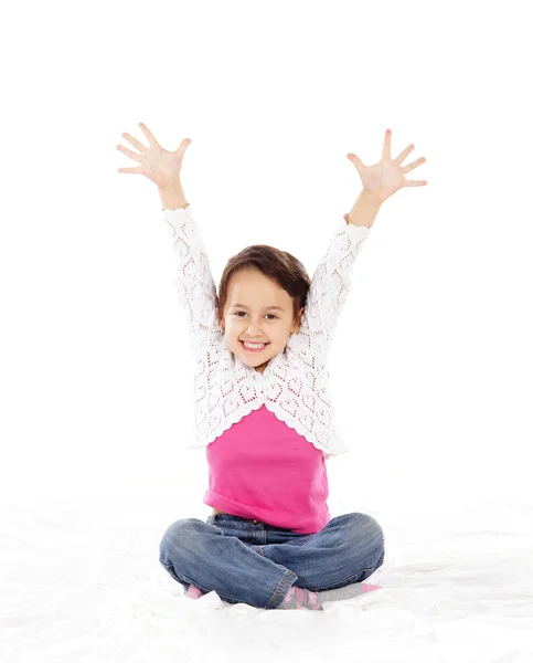 Uma menina jovem e feliz isolado em um fundo branco — Fotografia de Stock