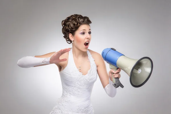 Angry bride with the megaphone — Stock Photo, Image