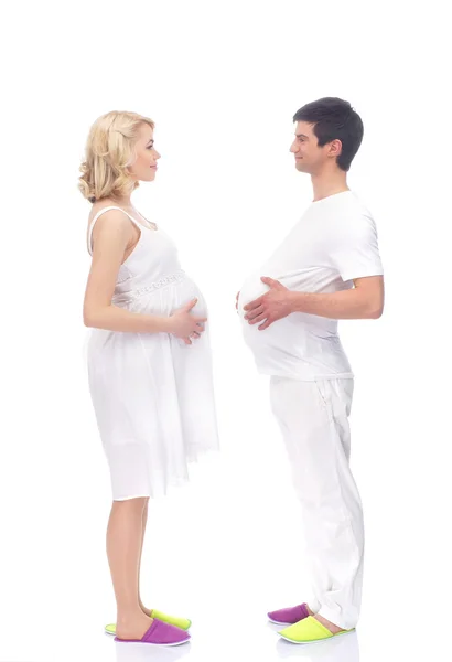 A happy couple: pregnant mother and a father on white — Stock Photo, Image