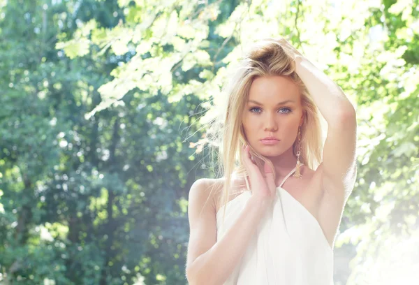 Beautiful blond girl posing outdoor — Stock Photo, Image