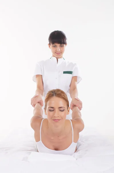 A young redhead woman on a Thai massage procedure — Stock Photo, Image