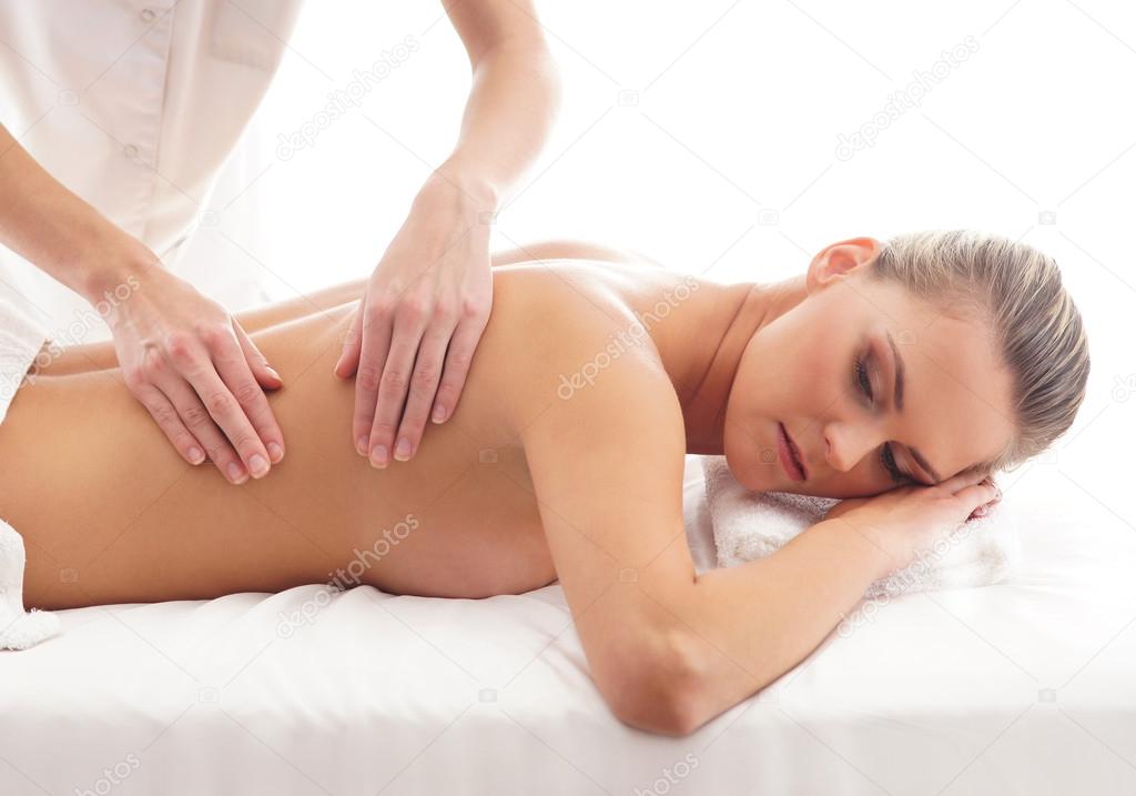 Young attractive woman getting spa treatment