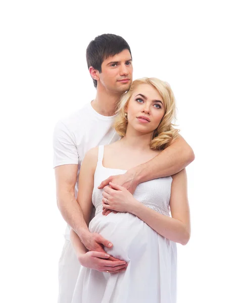 A happy couple: pregnant mother and a father on white — Stock Photo, Image