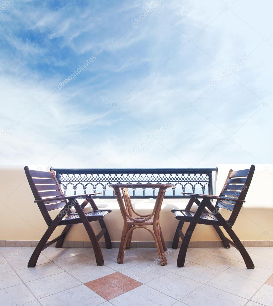 Two chairs on the balcony: Santorini resort