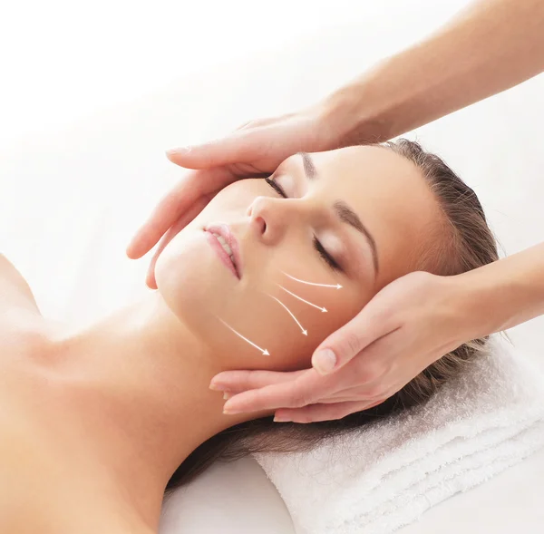 Young attractive woman getting spa treatment over white backgrou — Stock Photo, Image