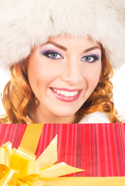 A happy woman posing in warm winter clothes — Stock Photo, Image