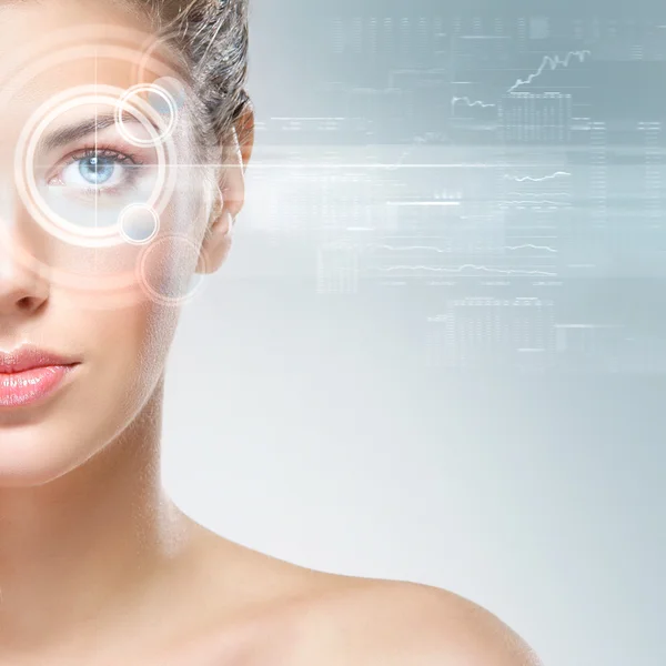 Portrait of a young woman with an eye hologram — Stock Photo, Image