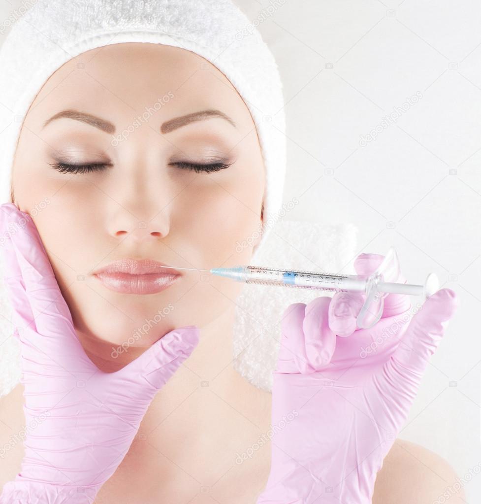 Beauty portrait of a young woman on a medical procedure