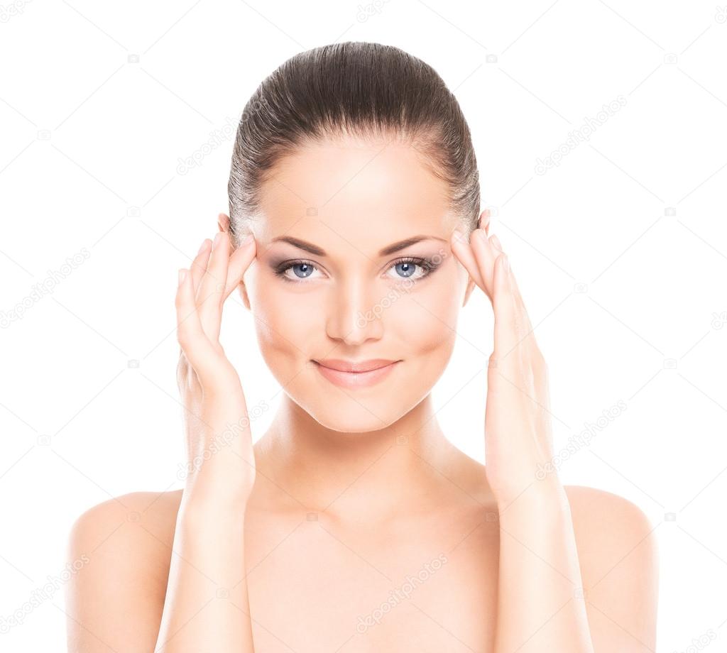 Beauty portrait of a young brunette woman in makeup