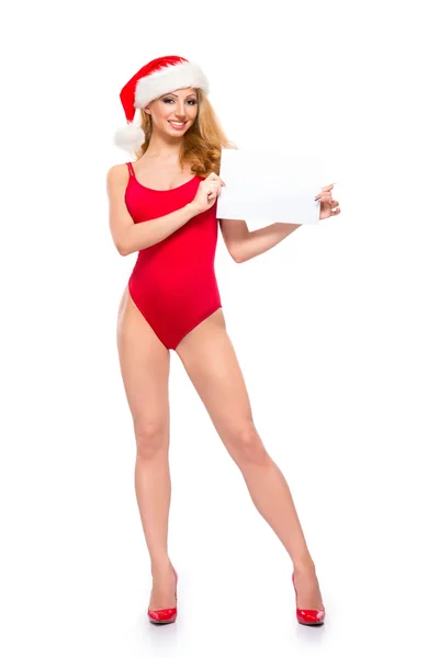 Una mujer joven y sexy posando en lencería erótica de Navidad — Foto de Stock