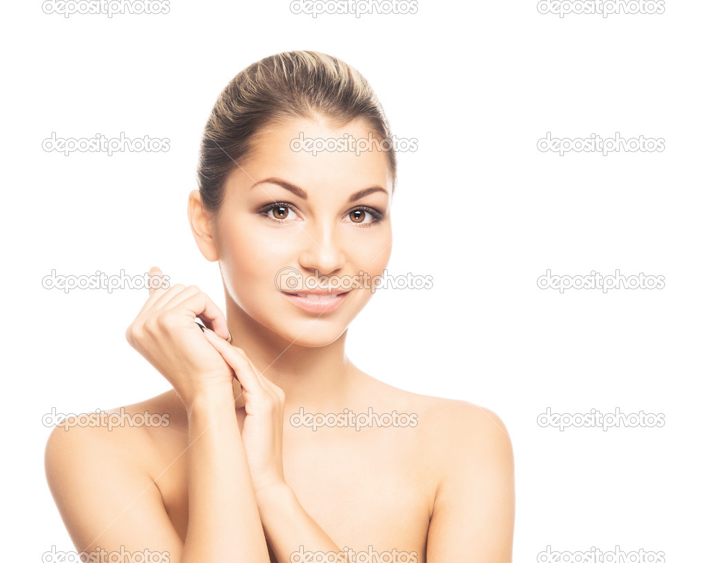 Portrait of a young naked woman posing in beautiful makeup