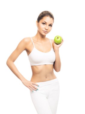 genç bir kadın ile bir havlu ve bir yeşil elma