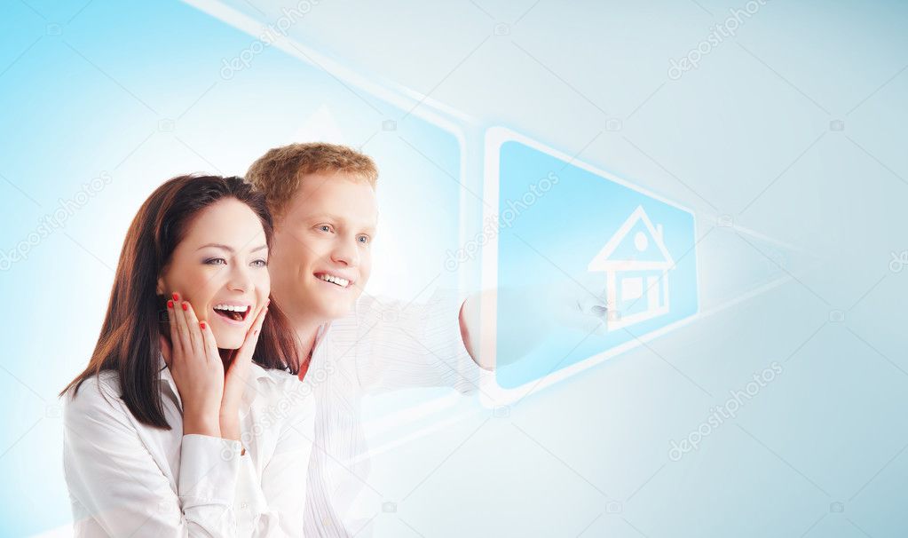 Young family choosing the new home