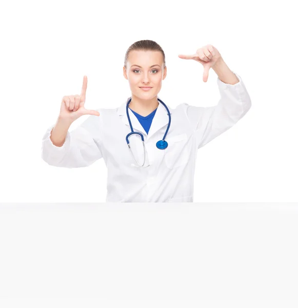 Doctor with blank billboard — Stock Photo, Image