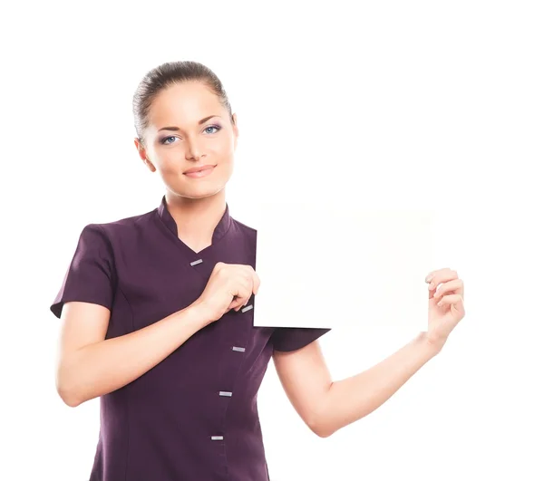 Una mujer joven con un uniforme púrpura aislado en blanco — Foto de Stock